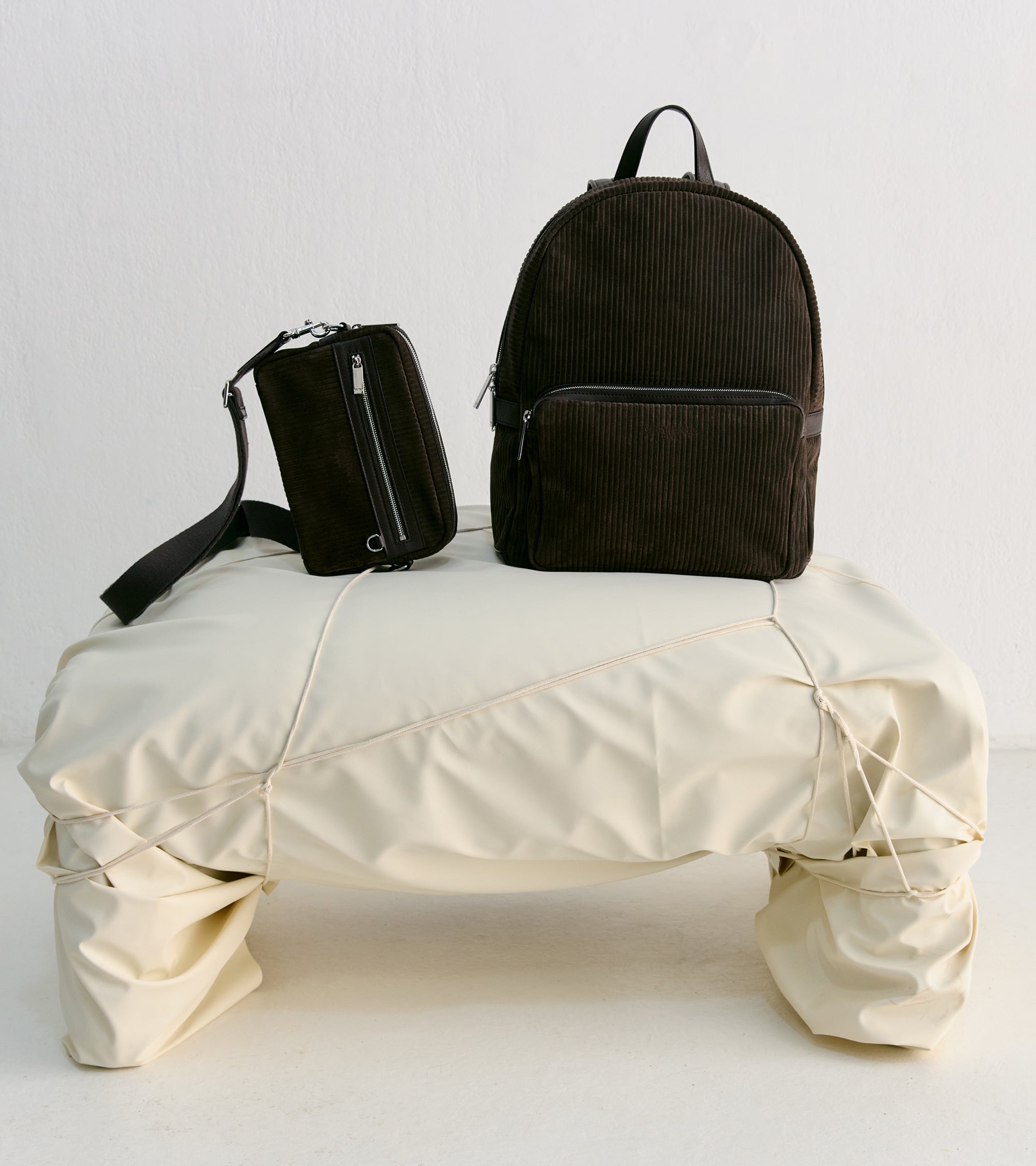 Emile camera bag in ribbed and smooth leather